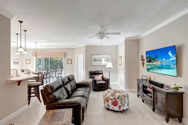 a large kitchen with a table and chairs