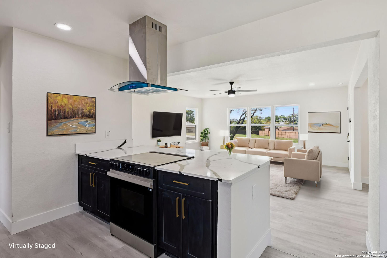 519 Jackson Keller Road San Antonio, TX 78216 - Photo 15 of 40 a kitchen with a stove a sink dishwasher and a refrigerator with wooden floor