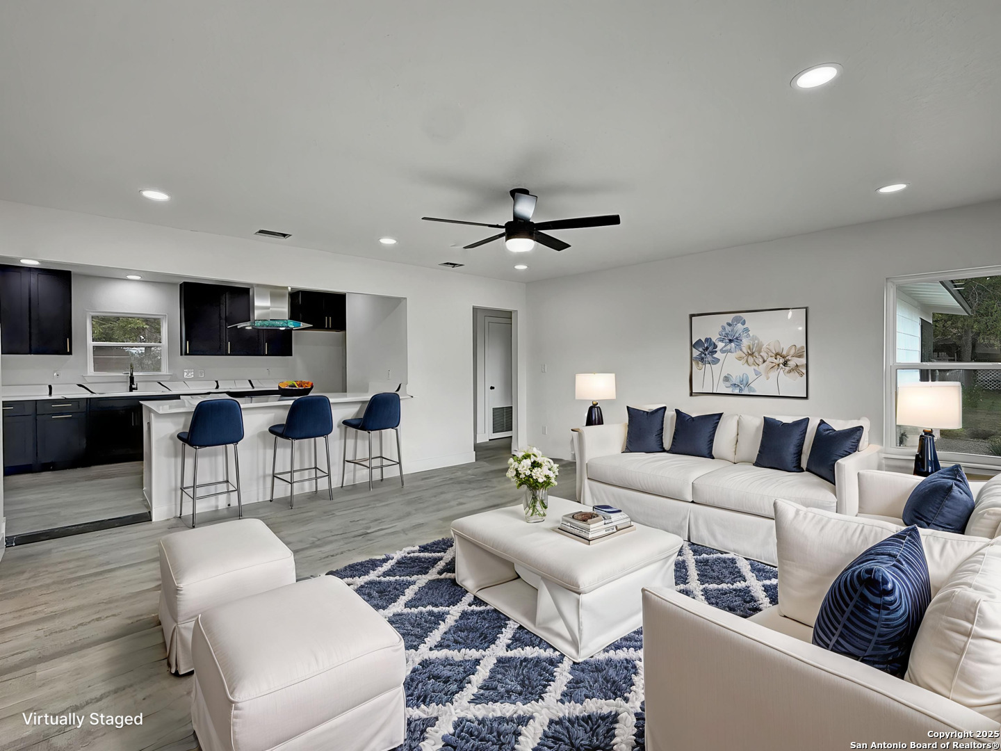 519 Jackson Keller Road San Antonio, TX 78216 - Photo 16 of 40 a living room with furniture and a view of kitchen