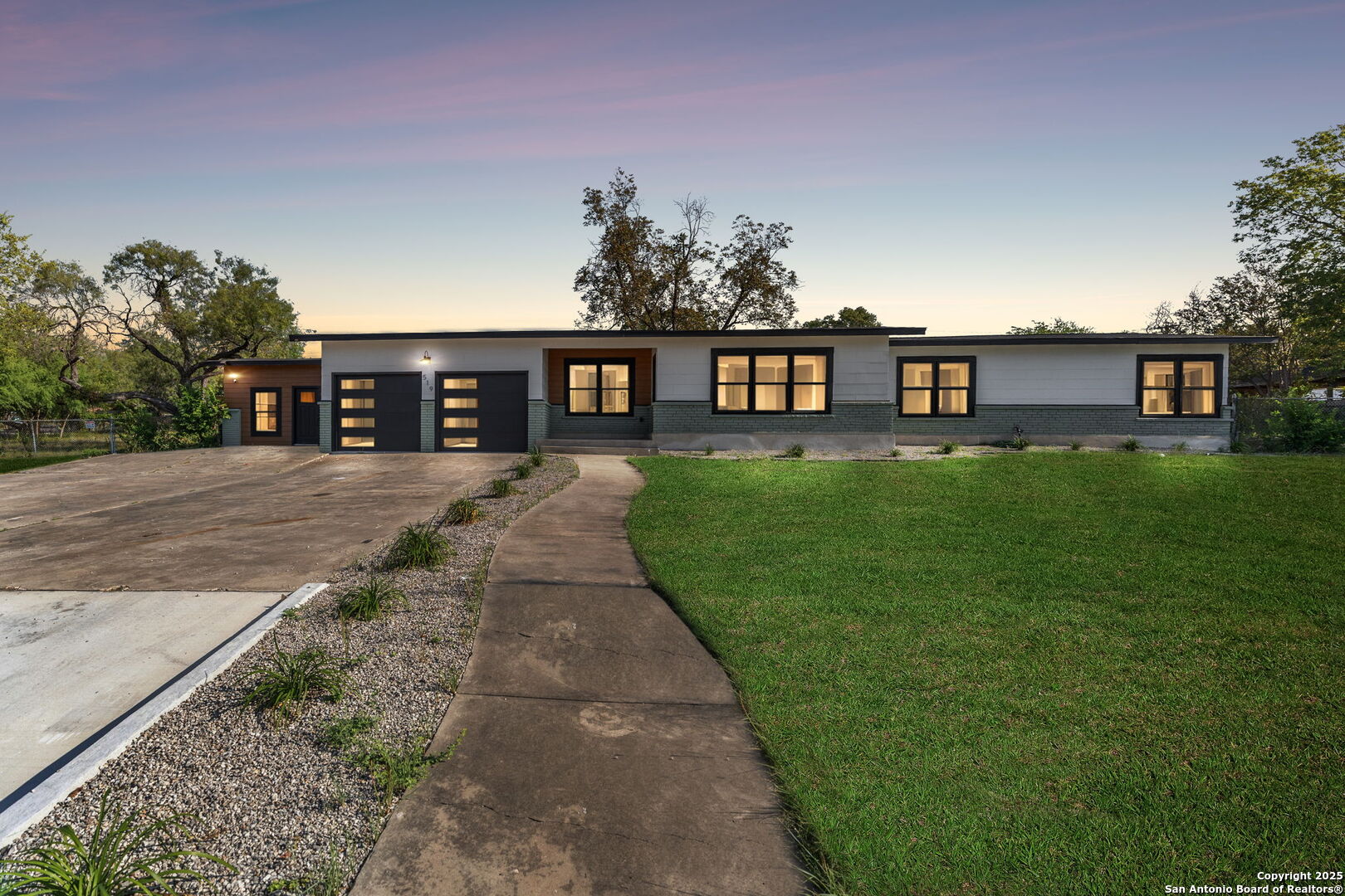 519 Jackson Keller Road San Antonio, TX 78216 - Photo 2 of 40 front view of a house with a yard