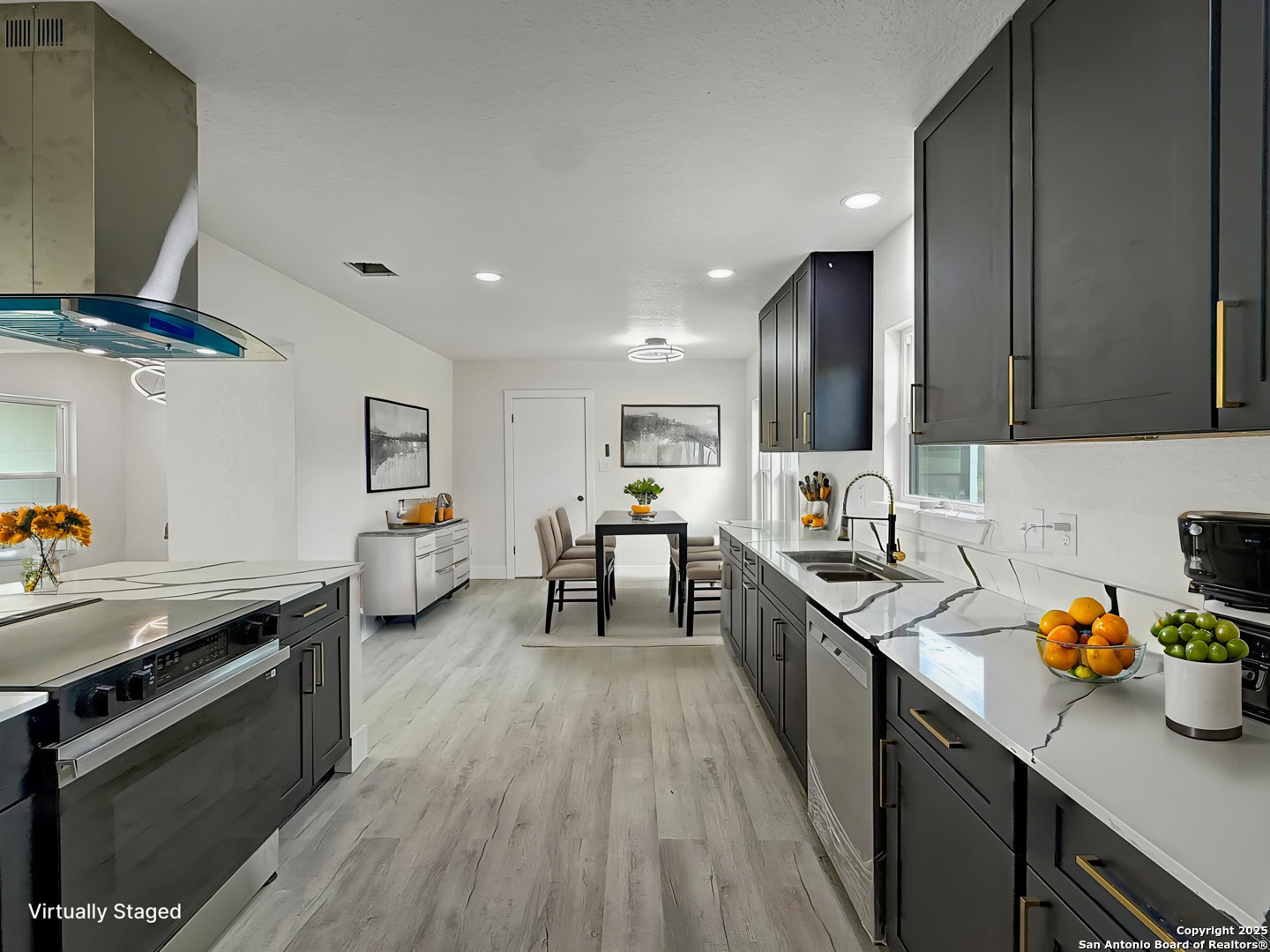 519 Jackson Keller Road San Antonio, TX 78216 - Photo 21 of 40 a kitchen with stainless steel appliances granite countertop sink stove top oven and cabinets