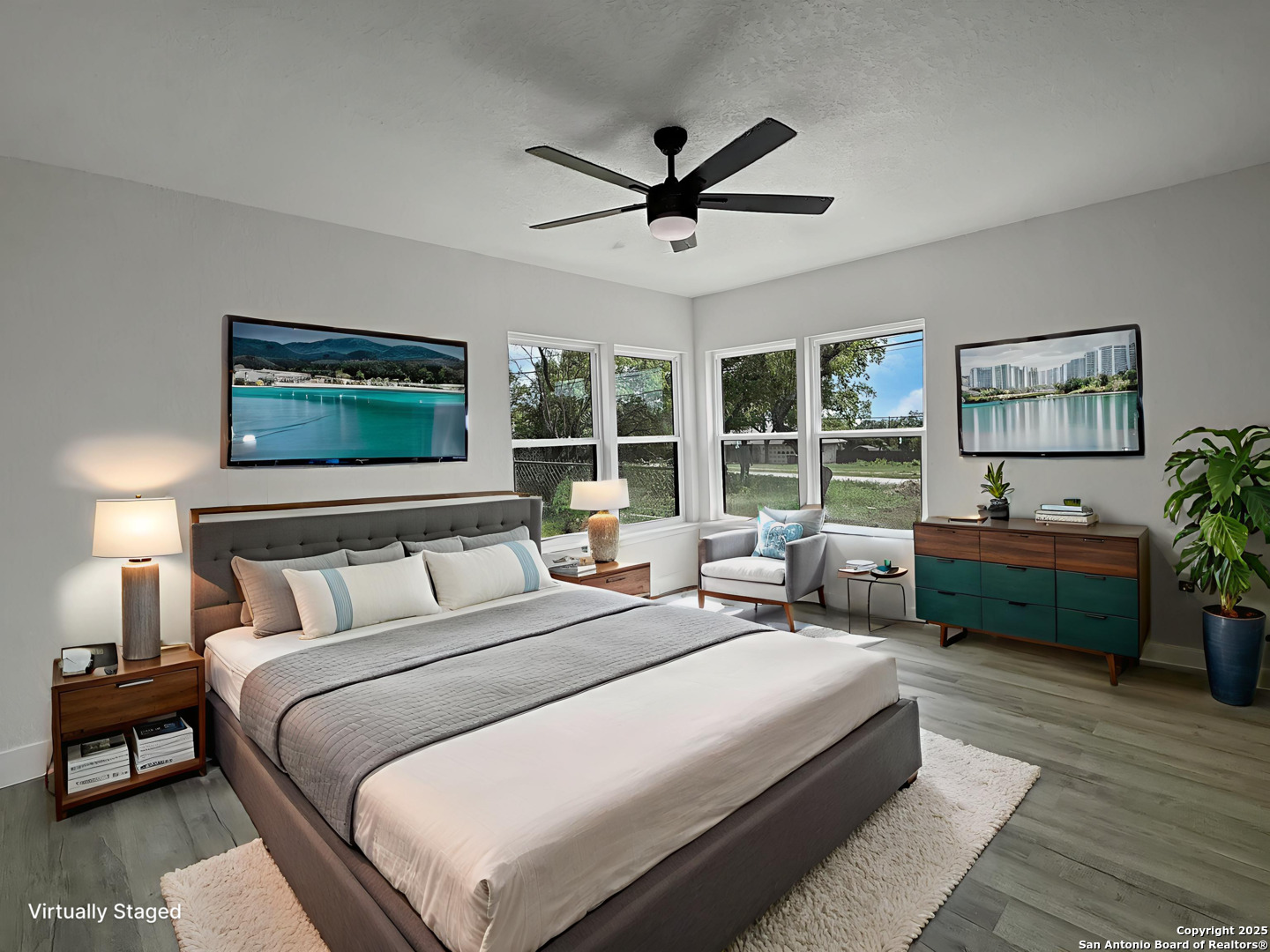 519 Jackson Keller Road San Antonio, TX 78216 - Photo 22 of 40 a bedroom with a large bed and a window