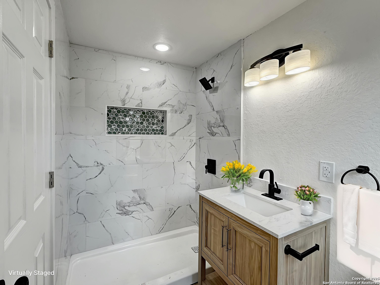 519 Jackson Keller Road San Antonio, TX 78216 - Photo 27 of 40 a bathroom with a sink a toilet and shower