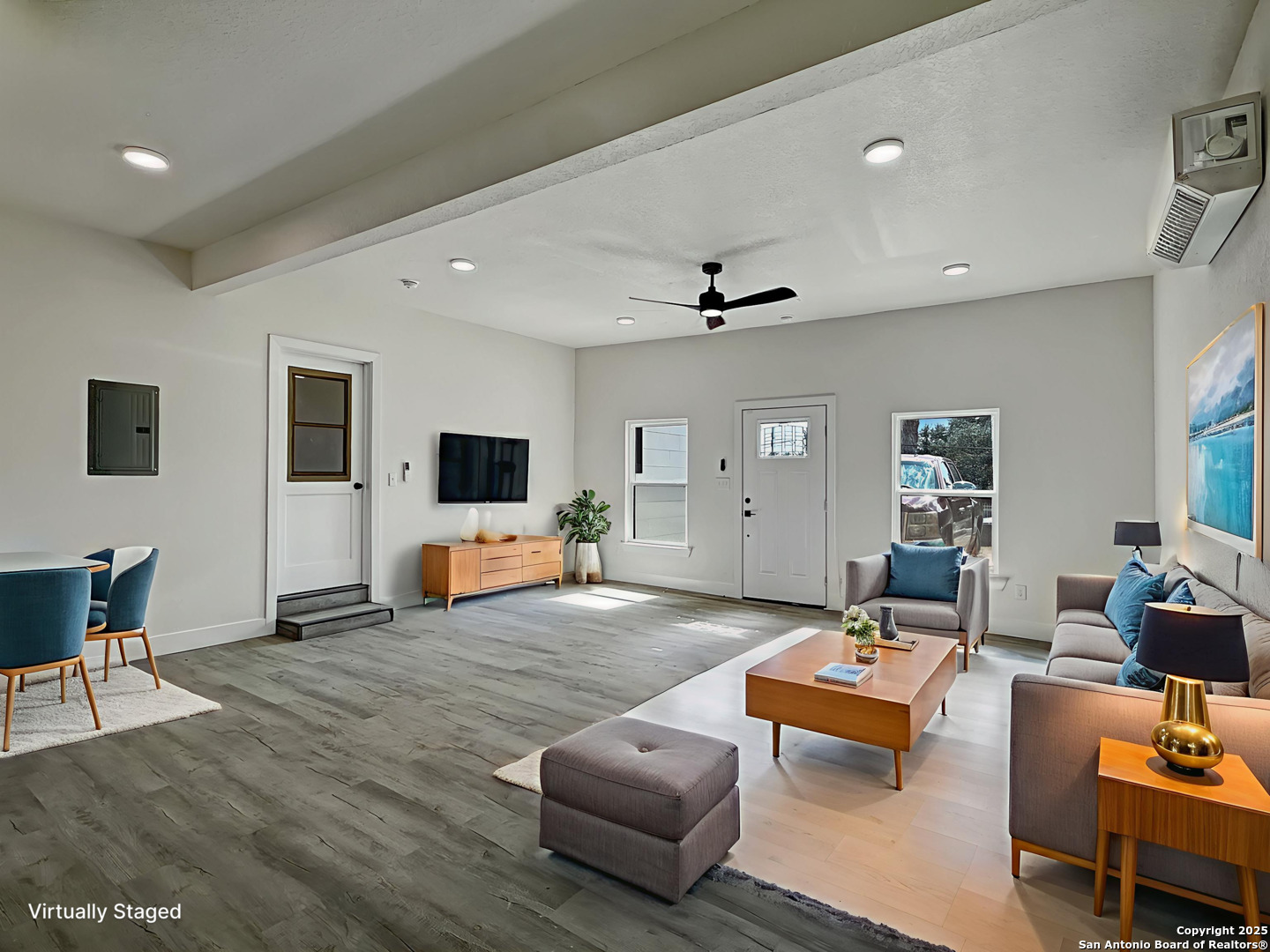519 Jackson Keller Road San Antonio, TX 78216 - Photo 31 of 40 a living room with furniture and a flat screen tv