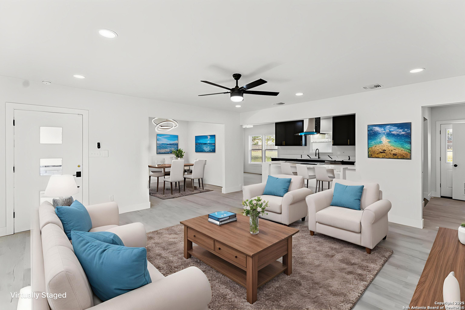 519 Jackson Keller Road San Antonio, TX 78216 - Photo 8 of 40 a living room with furniture a fireplace and a flat screen tv