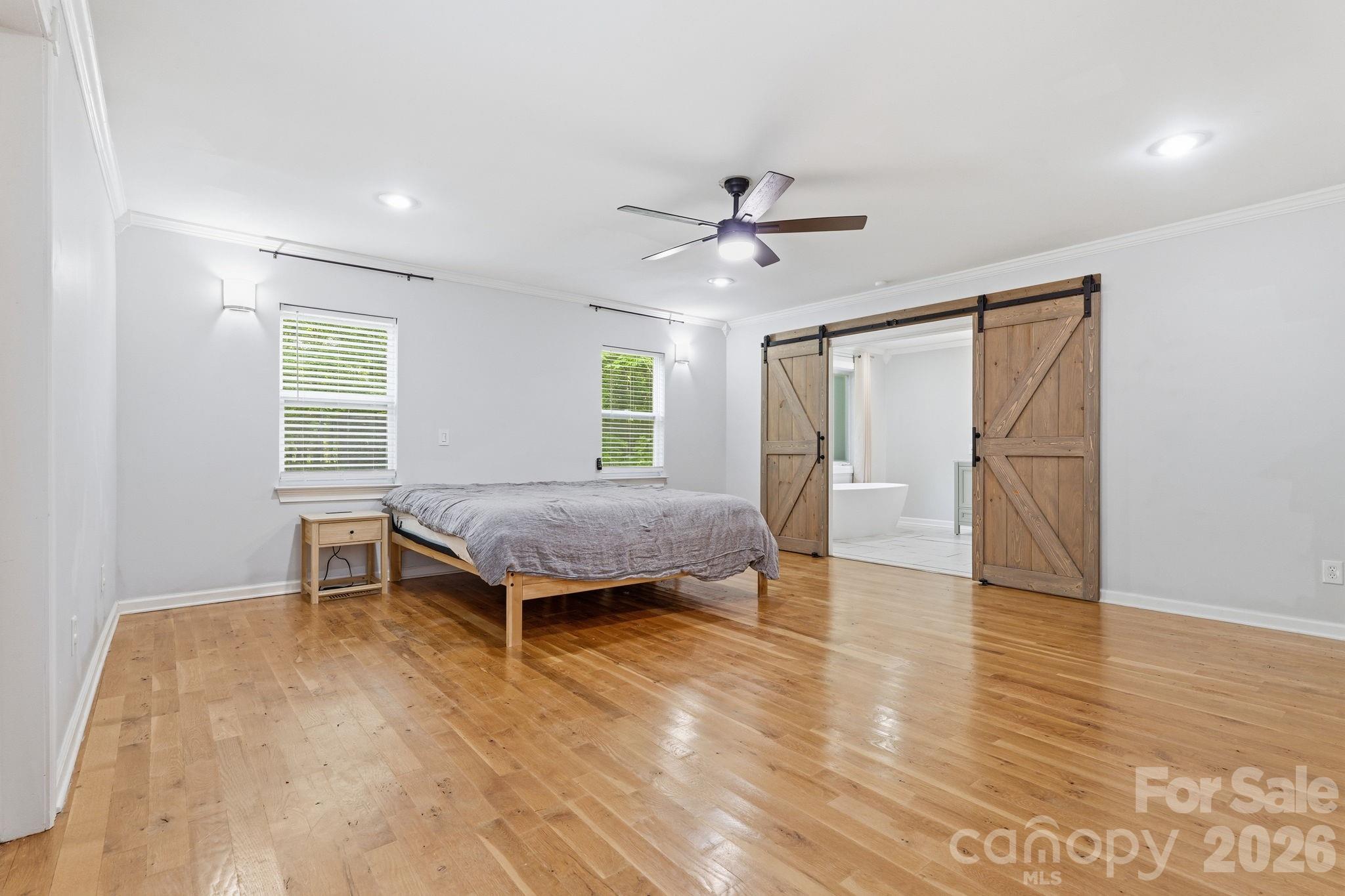 5347 Haney Road York, SC 29745 - Photo 18 of 39 a spacious bedroom with a bed and window