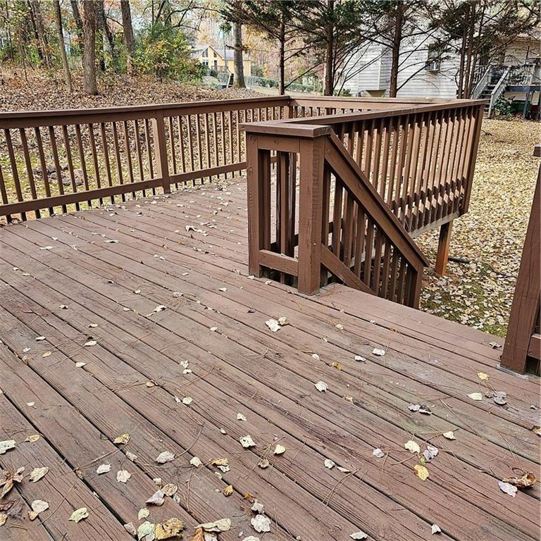 1955 Morgan Trace Canton, GA 30115 - Photo 16 of 17 a balcony with wooden floor