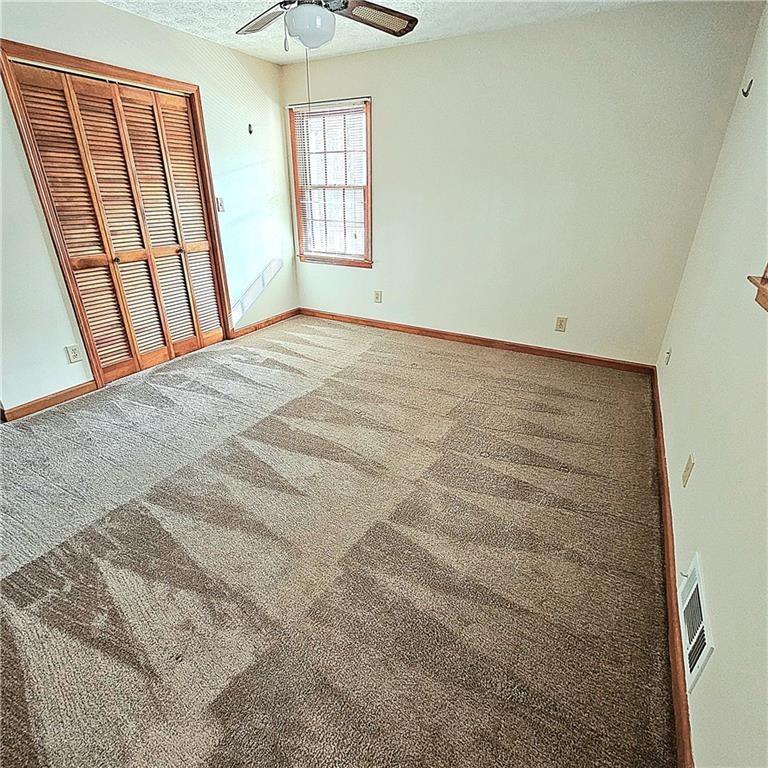 1955 Morgan Trace Canton, GA 30115 - Photo 9 of 17 a view of an empty room with a window