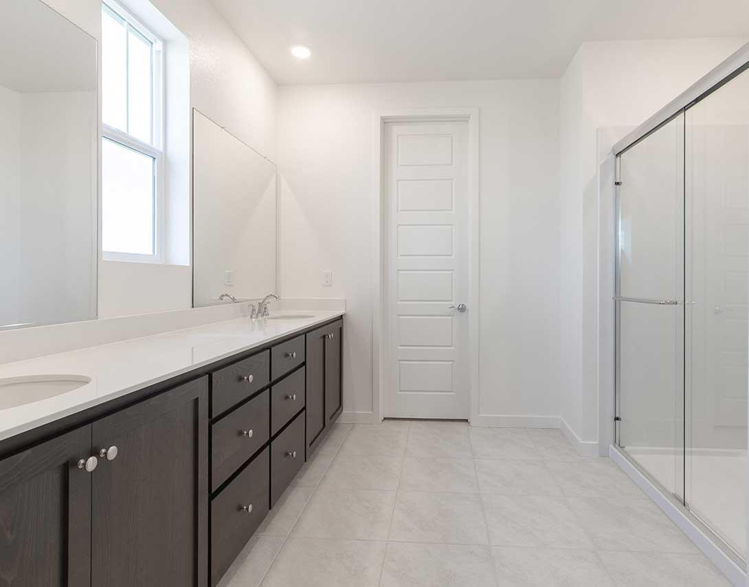 312 West Pasqua Glen Mountain House, CA 95391 - Photo 14 of 16 a bathroom with double sink and a mirror