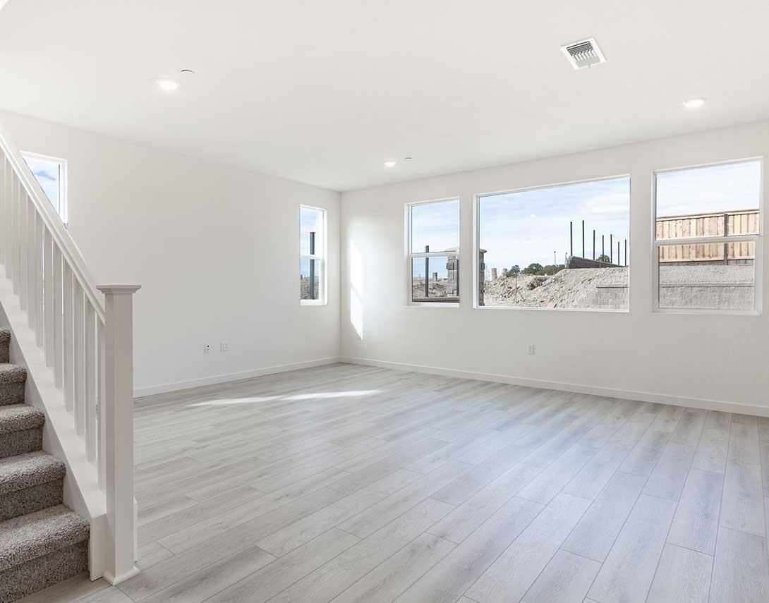 312 West Pasqua Glen Mountain House, CA 95391 - Photo 4 of 16 a view of an empty room with a window and wooden floor