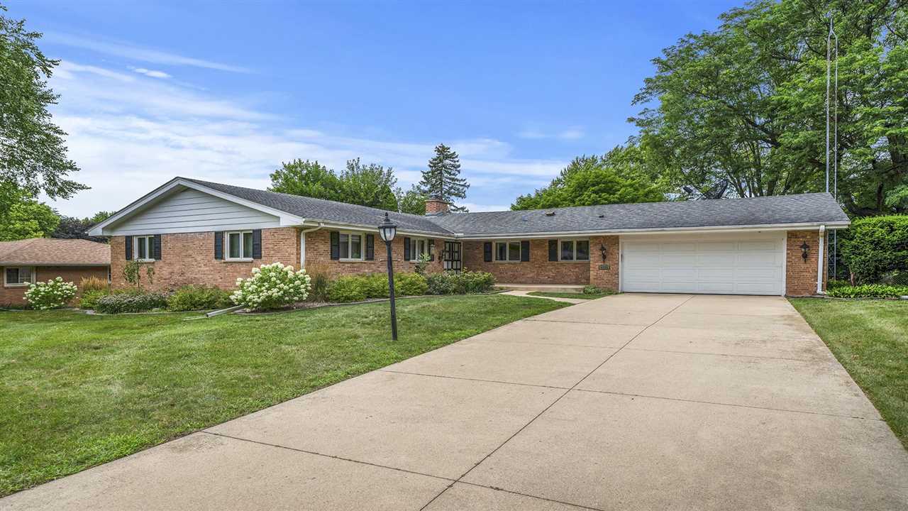 4114 Landstrom Road Rockford, IL 61114 - Photo 1 of 38 front view of a house and a yard