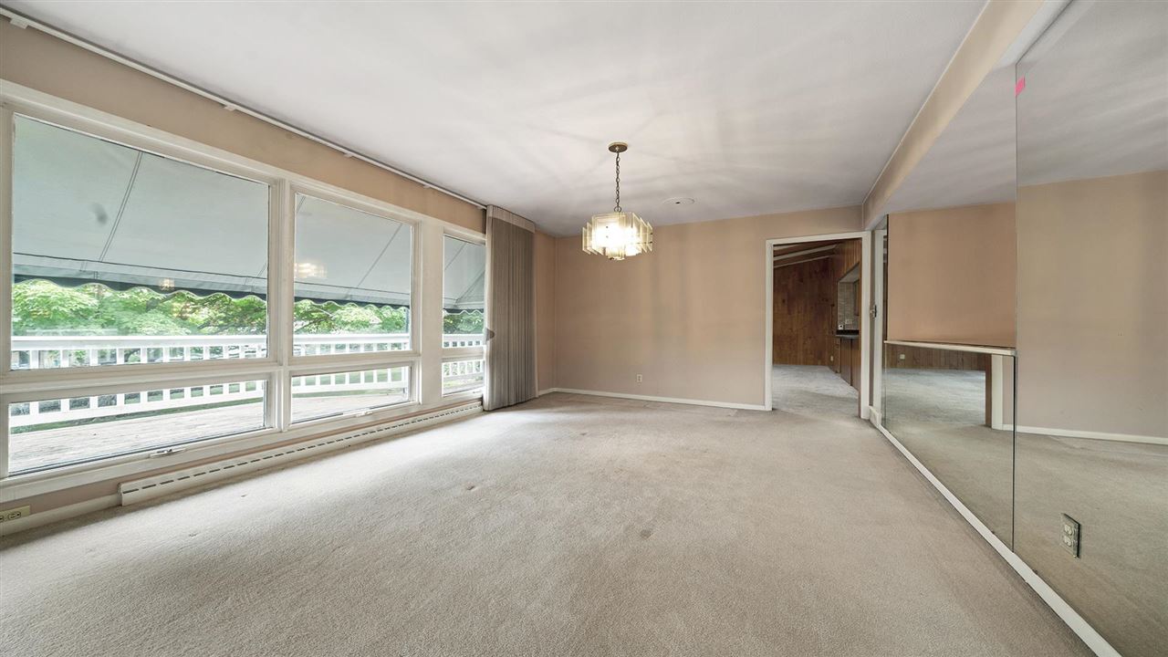 4114 Landstrom Road Rockford, IL 61114 - Photo 11 of 38 a view of a livingroom with a ceiling fan and window
