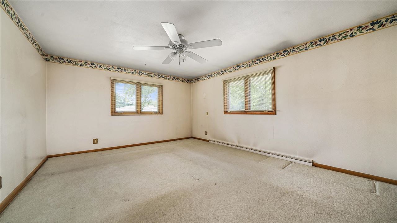 4114 Landstrom Road Rockford, IL 61114 - Photo 16 of 38 a view of an empty room with a window