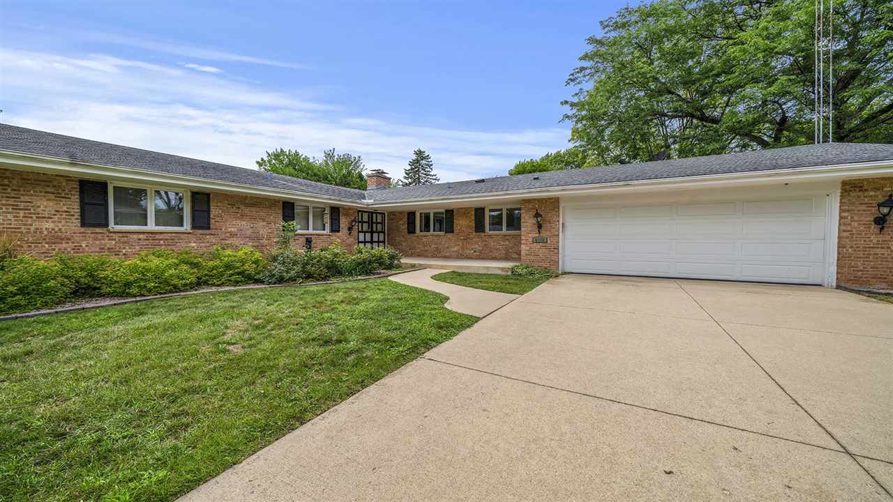 4114 Landstrom Road Rockford, IL 61114 - Photo 3 of 38 a front view of house with yard and green space