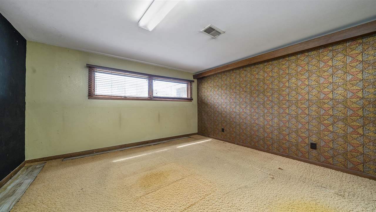 4114 Landstrom Road Rockford, IL 61114 - Photo 33 of 38 an empty room with a window