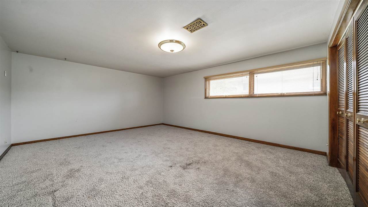 4114 Landstrom Road Rockford, IL 61114 - Photo 34 of 38 an empty room with windows