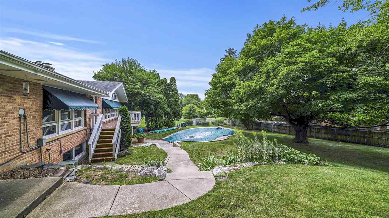 4114 Landstrom Road Rockford, IL 61114 - Photo 37 of 38 a view of a house with a yard