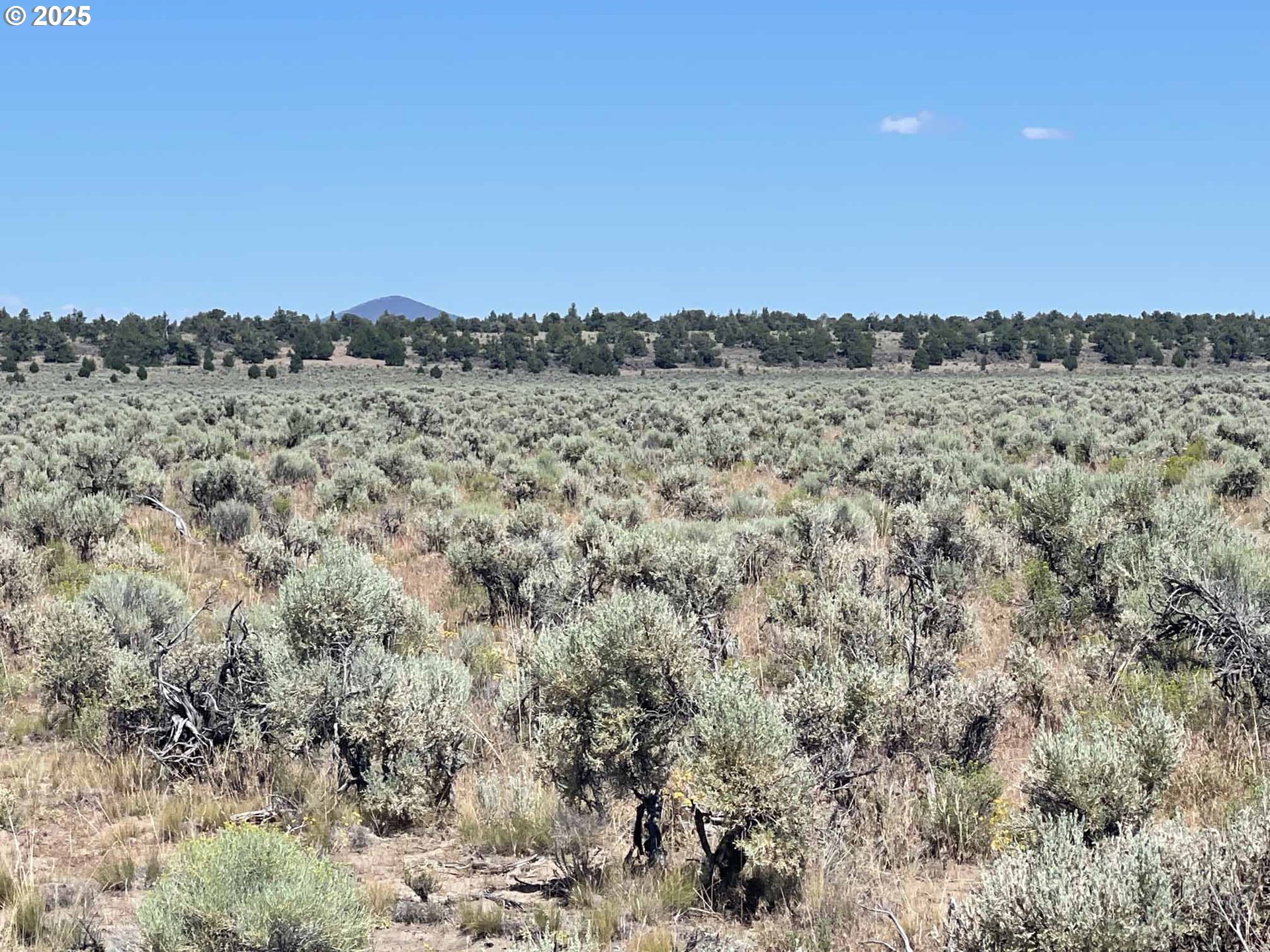 Benjamin Lake Road, Unit L 502 Christmas Valley, OR 97641 - Photo 28 of 31 a view of a large building with a city view