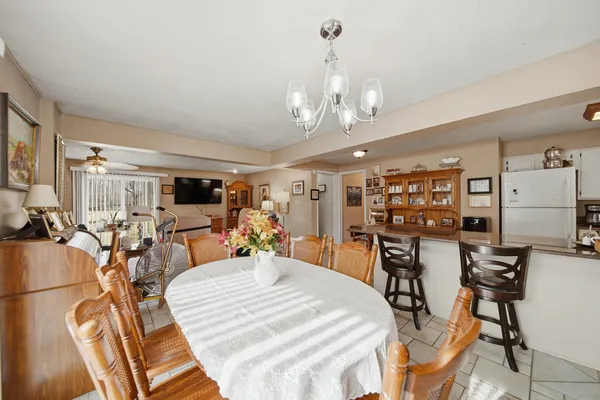 a kitchen with a sink and a stove top oven