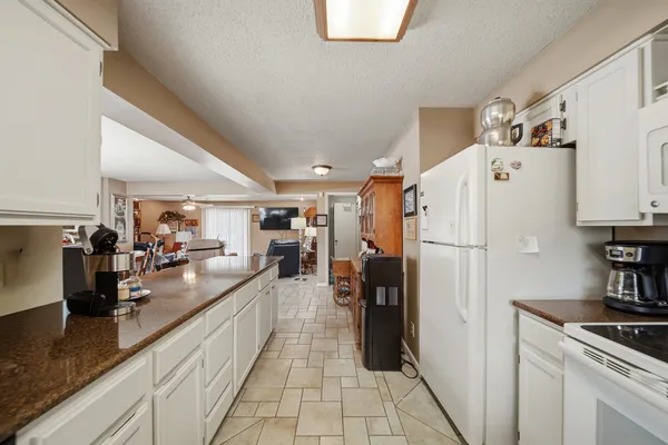 a living room with large lots of books
