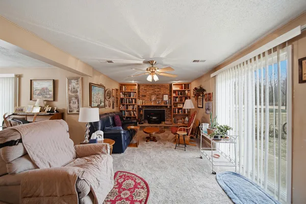 a bathroom with a sink vanity mirror and toilet