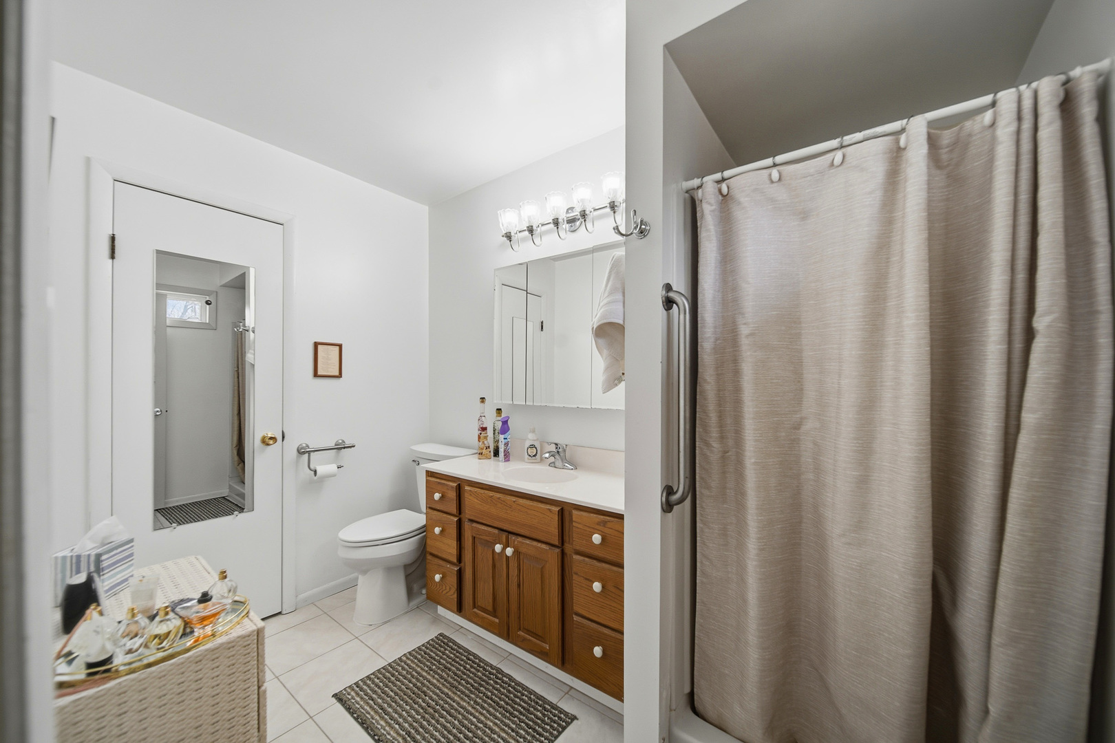 1307 Sinnissippi Road Sterling, IL 61081 - Photo 31 of 33 a spacious bathroom with a shower toilet and sink