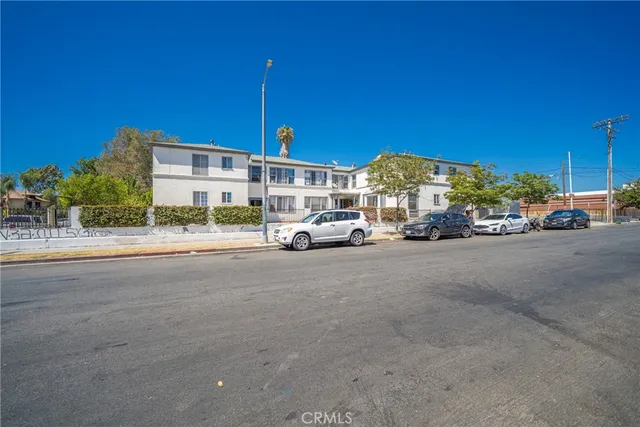 an aerial view of houses with outdoor space
