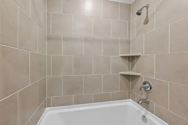 a bathroom with a sink and a tub