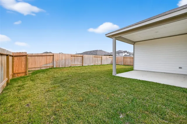 a view of a backyard with a garden