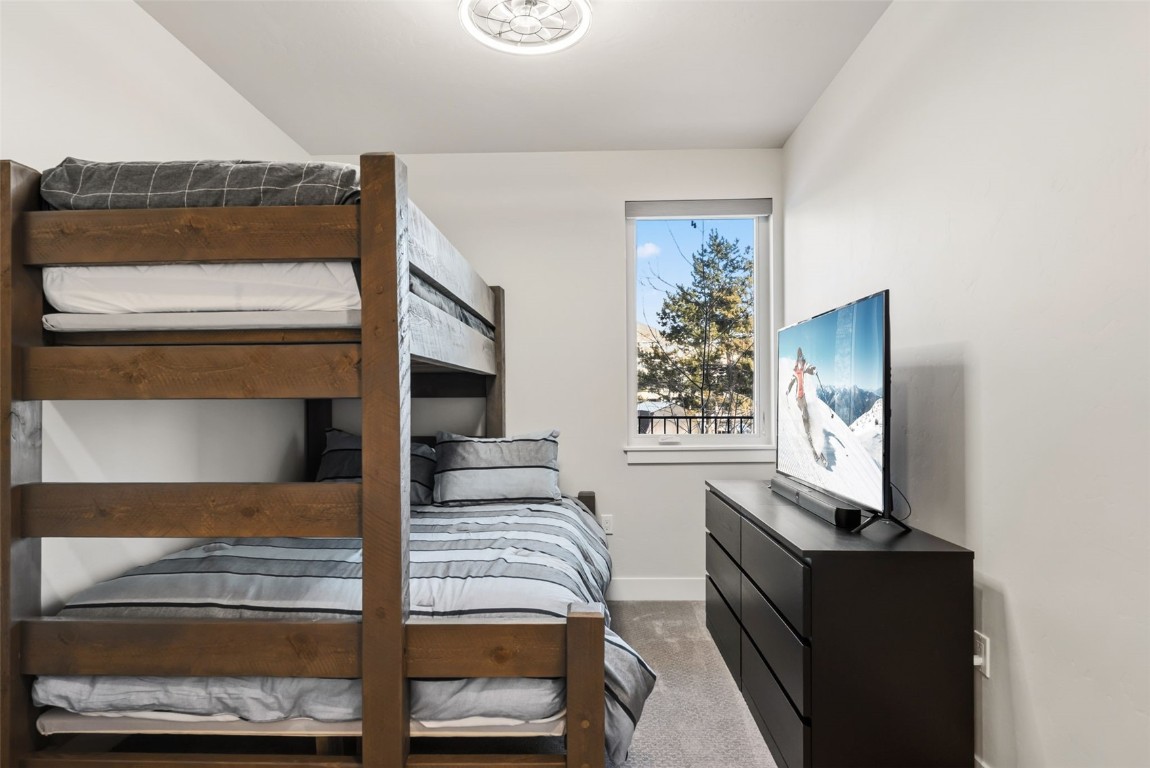 235 La Bonte Street, Unit 106 Dillon, CO 80435 - Photo 15 of 37 a living room with furniture and a flat screen tv