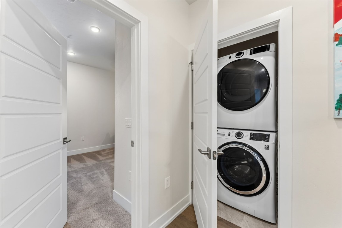 235 La Bonte Street, Unit 106 Dillon, CO 80435 - Photo 19 of 37 a view of a hallway with washer and dryer