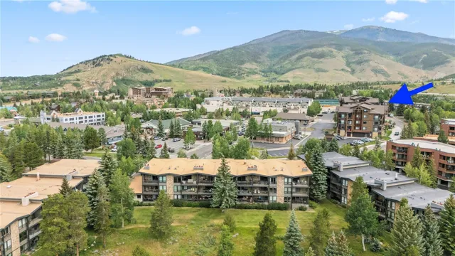 a view of a city with mountains in the background