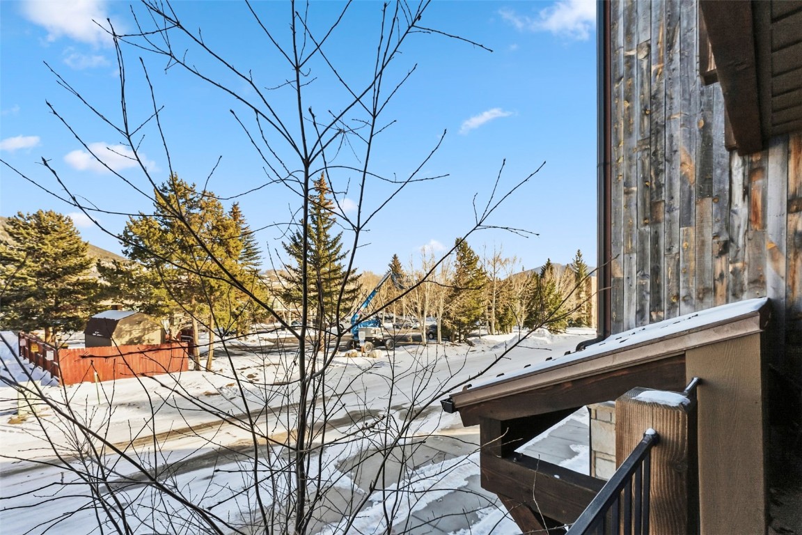 235 La Bonte Street, Unit 106 Dillon, CO 80435 - Photo 23 of 37 a view of a chairs and table in the balcony
