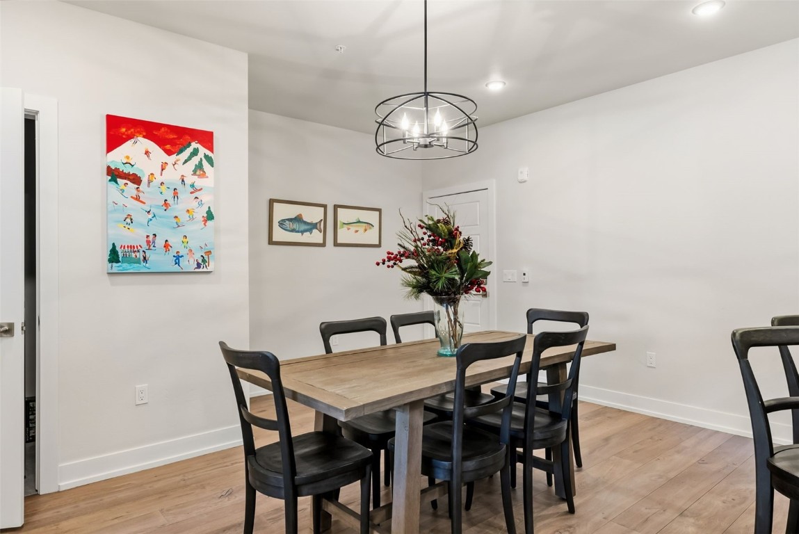 235 La Bonte Street, Unit 106 Dillon, CO 80435 - Photo 30 of 37 a view of a dining room with furniture and chandelier