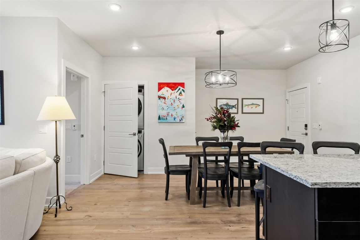 235 La Bonte Street, Unit 106 Dillon, CO 80435 - Photo 31 of 37 a view of a dining room with furniture window and wooden floor