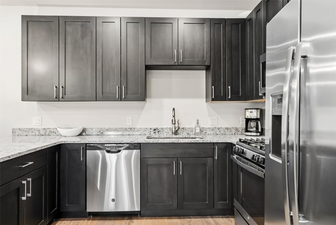 235 La Bonte Street, Unit 106 Dillon, CO 80435 - Photo 33 of 37 a kitchen with a sink and cabinets