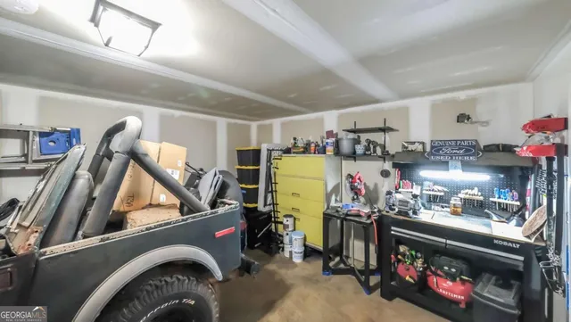 a view of house with a yard and sitting area