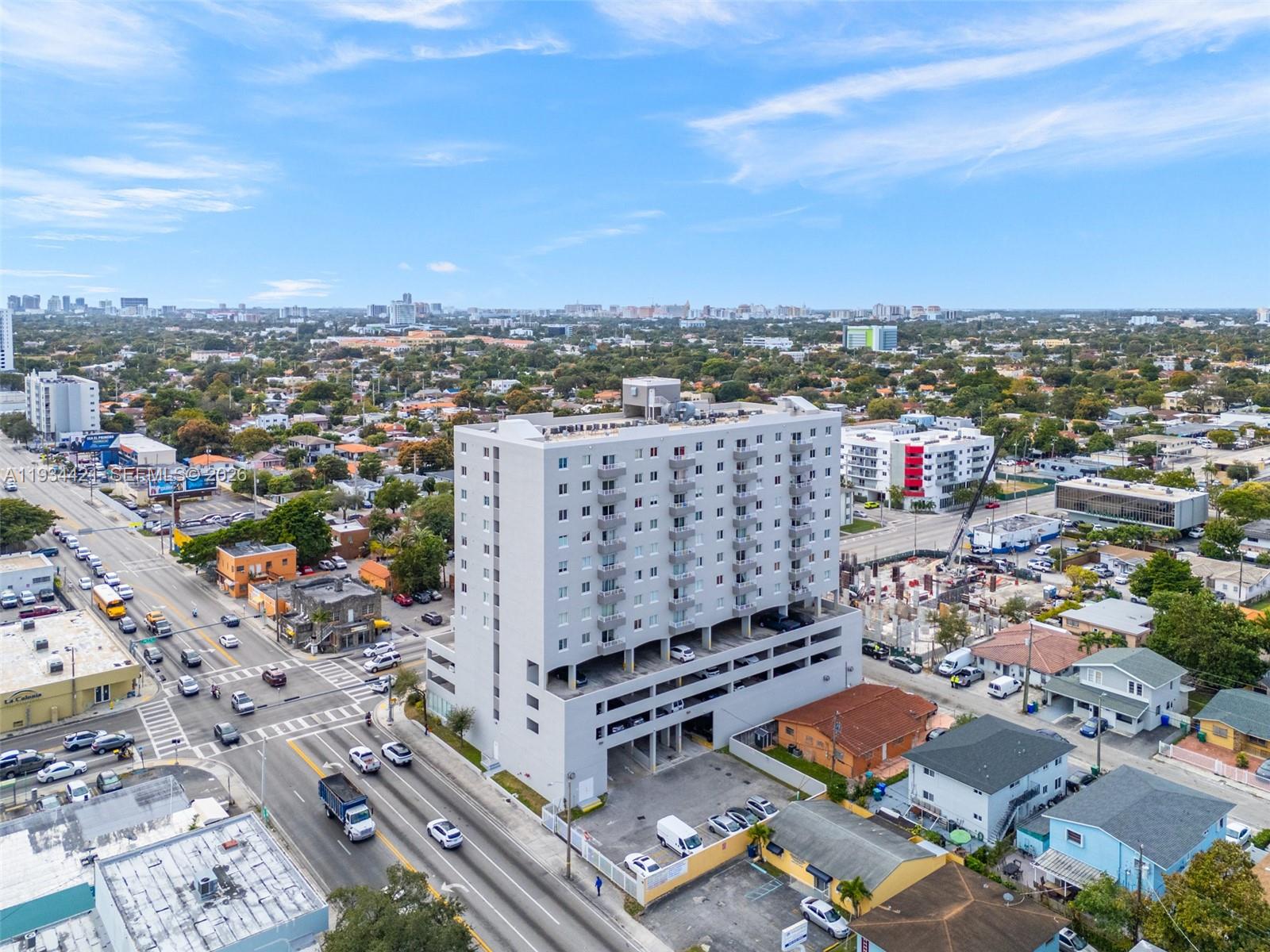 2217 Northwest 7th Street, Unit 902 Miami, FL 33125 - Photo 3 of 10 an aerial view of a city with lots of residential buildings