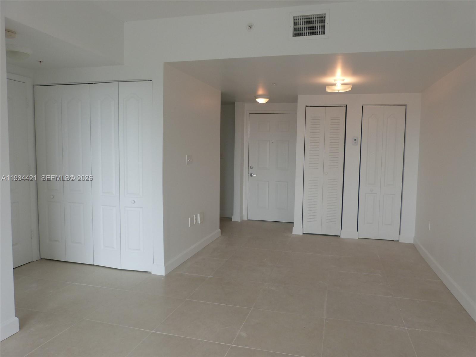 2217 Northwest 7th Street, Unit 902 Miami, FL 33125 - Photo 9 of 10 a view of an empty room