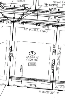 a picture of a room with a table and chairs