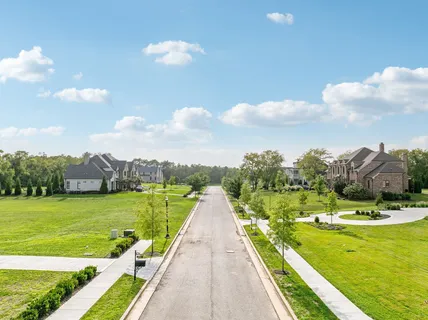 a view of a lake with a big yard