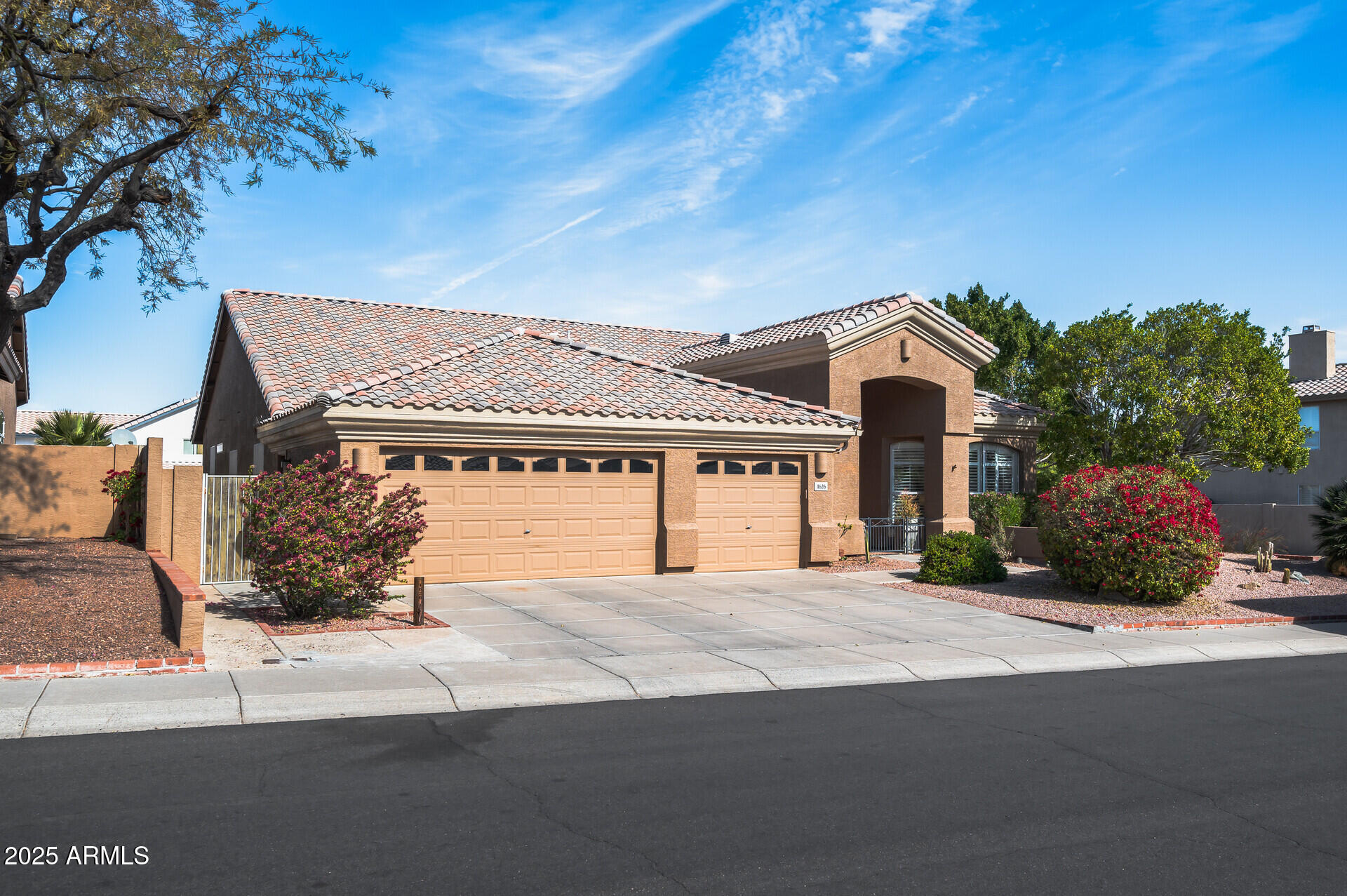 1626 East Kathleen Road Phoenix, AZ 85022 - Photo 1 of 47 a front view of a house with a yard and garage