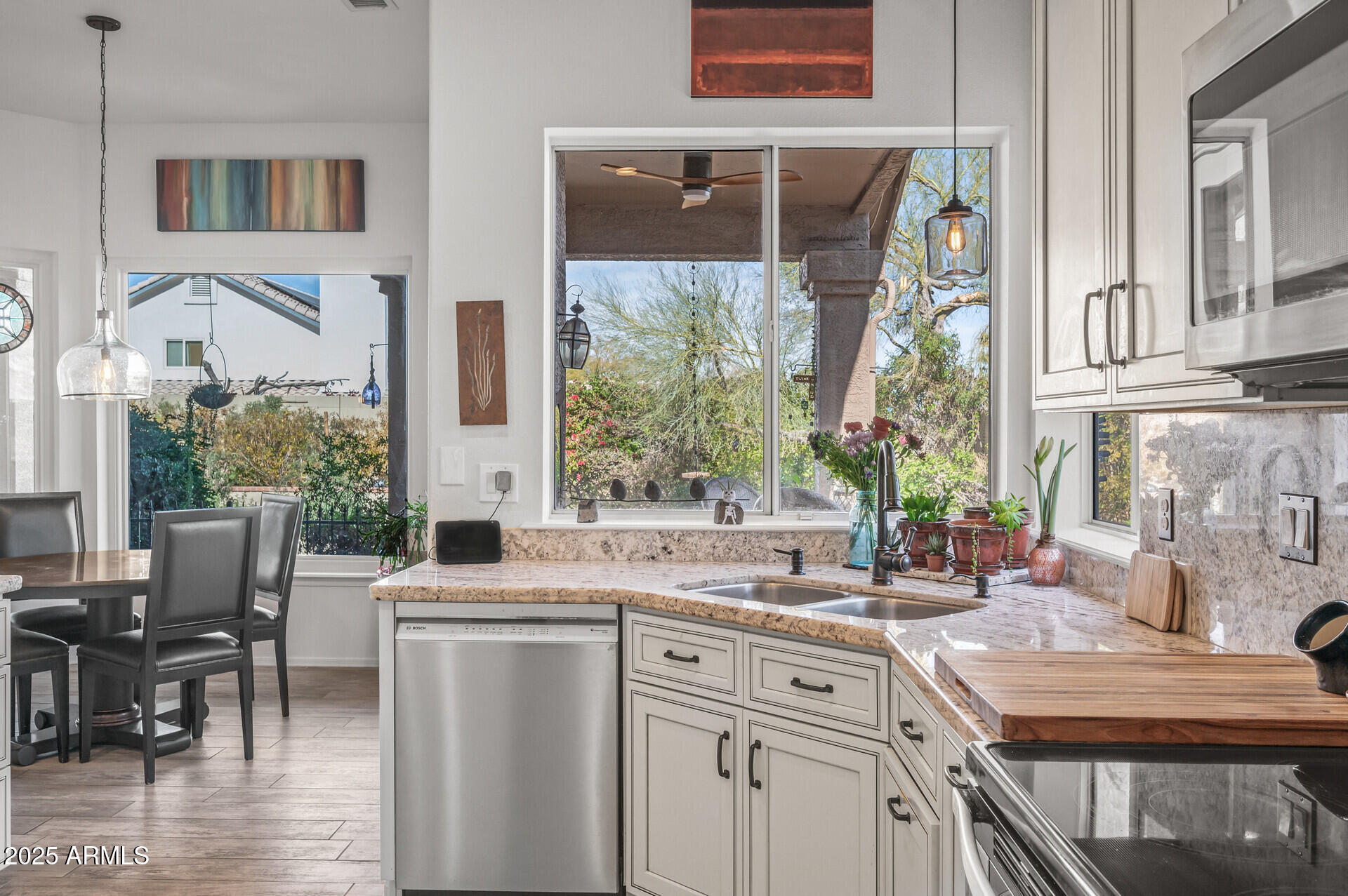 1626 East Kathleen Road Phoenix, AZ 85022 - Photo 20 of 47 a kitchen with a table chairs and window