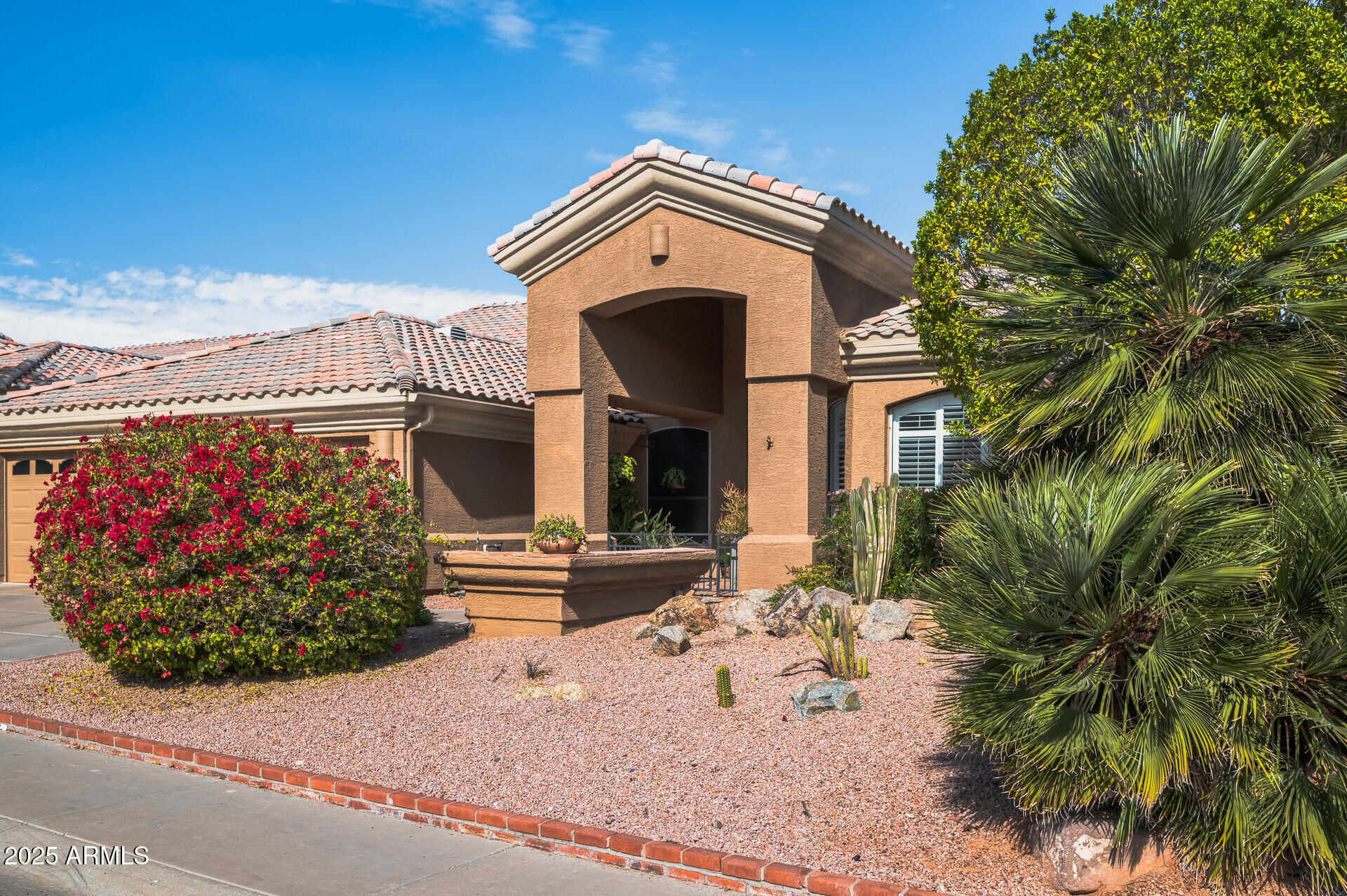 1626 East Kathleen Road Phoenix, AZ 85022 - Photo 2 of 47 a front view of a house with a yard