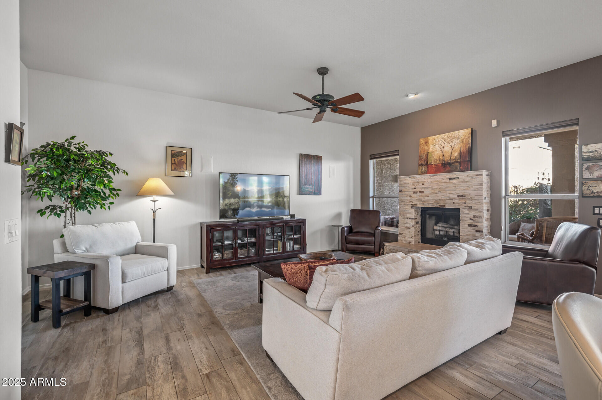1626 East Kathleen Road Phoenix, AZ 85022 - Photo 28 of 47 a living room with furniture and a fireplace
