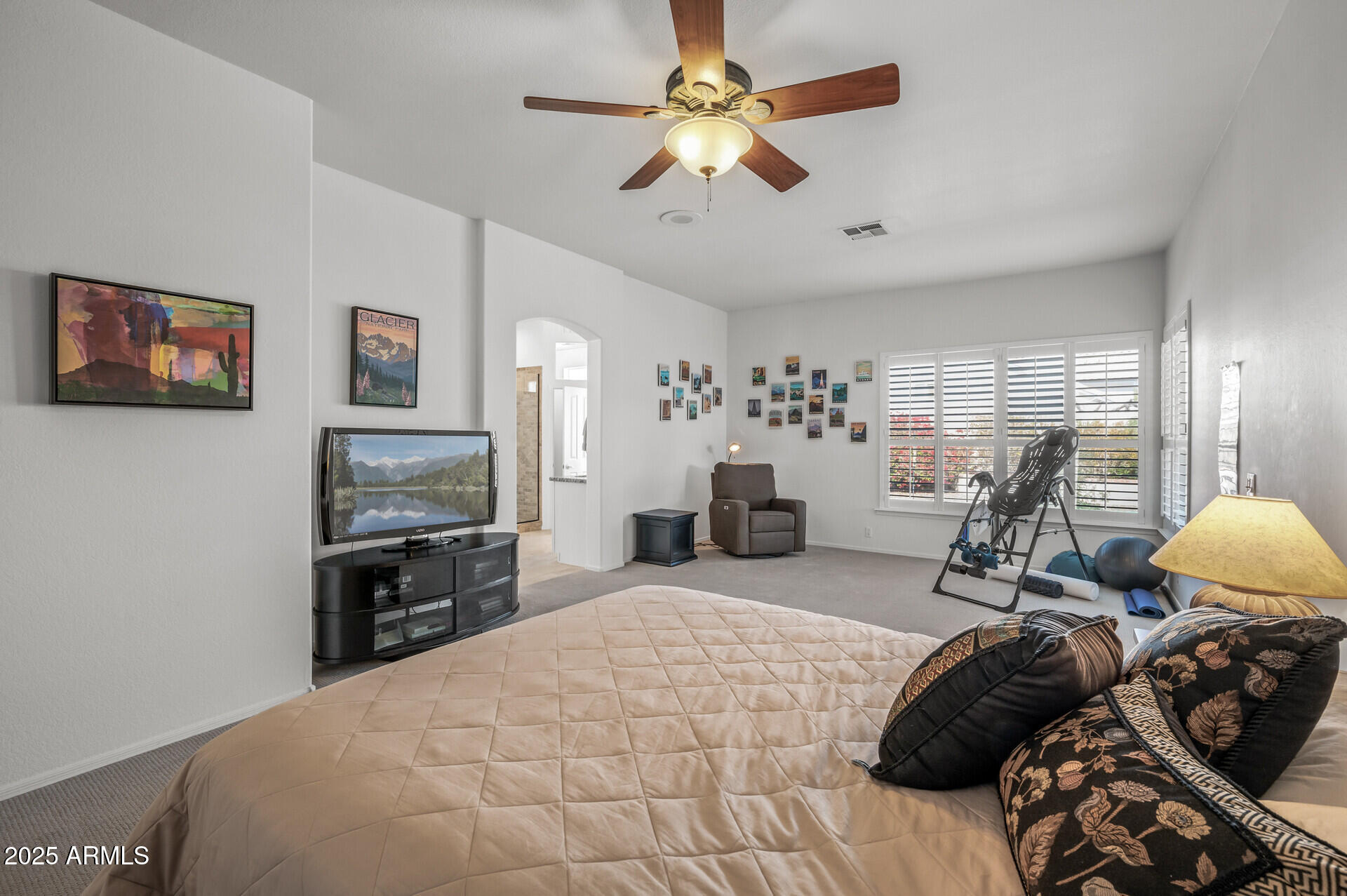 1626 East Kathleen Road Phoenix, AZ 85022 - Photo 30 of 47 a bedroom with furniture and a flat screen tv