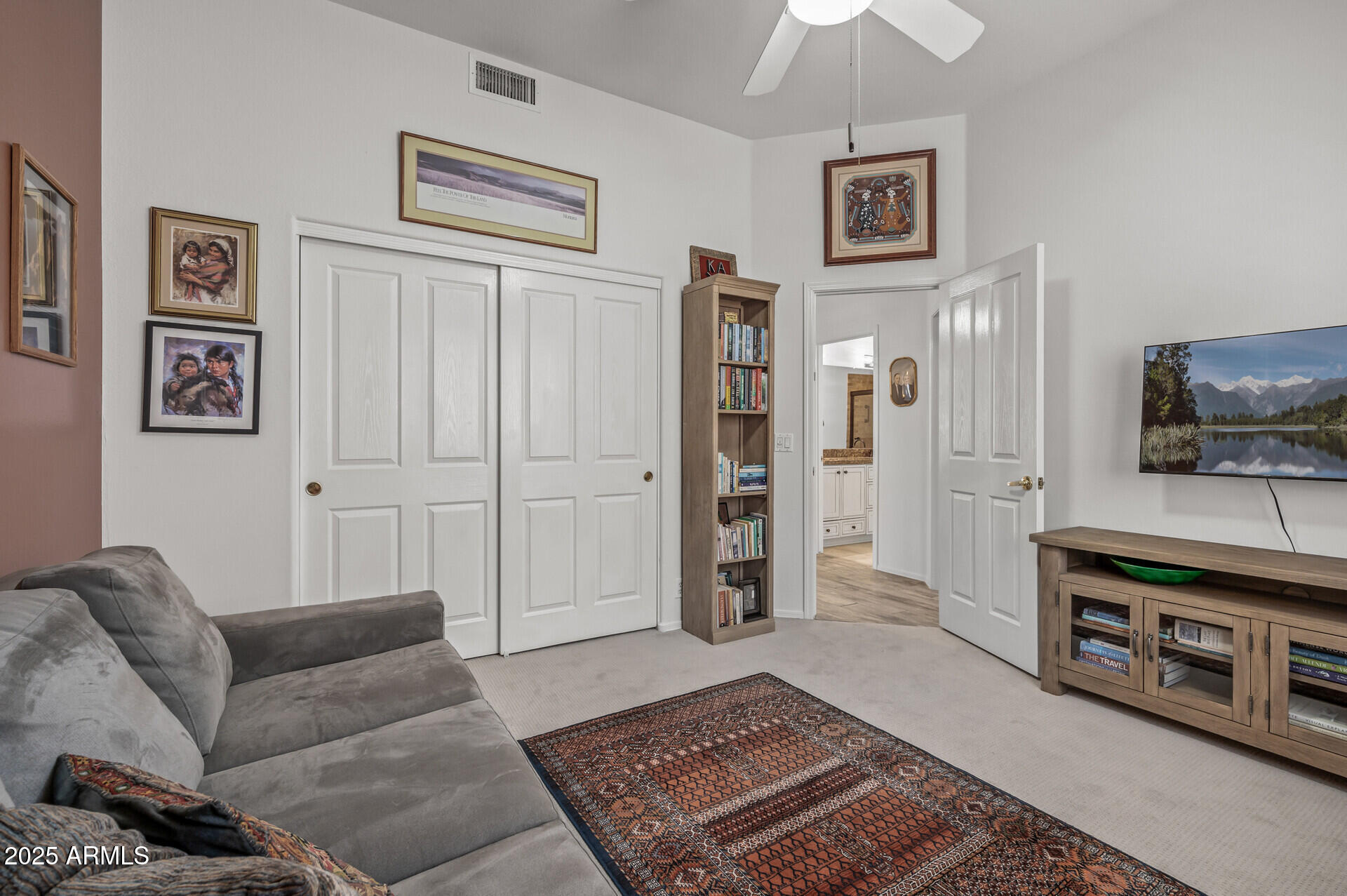 1626 East Kathleen Road Phoenix, AZ 85022 - Photo 36 of 47 a living room with furniture and a flat screen tv