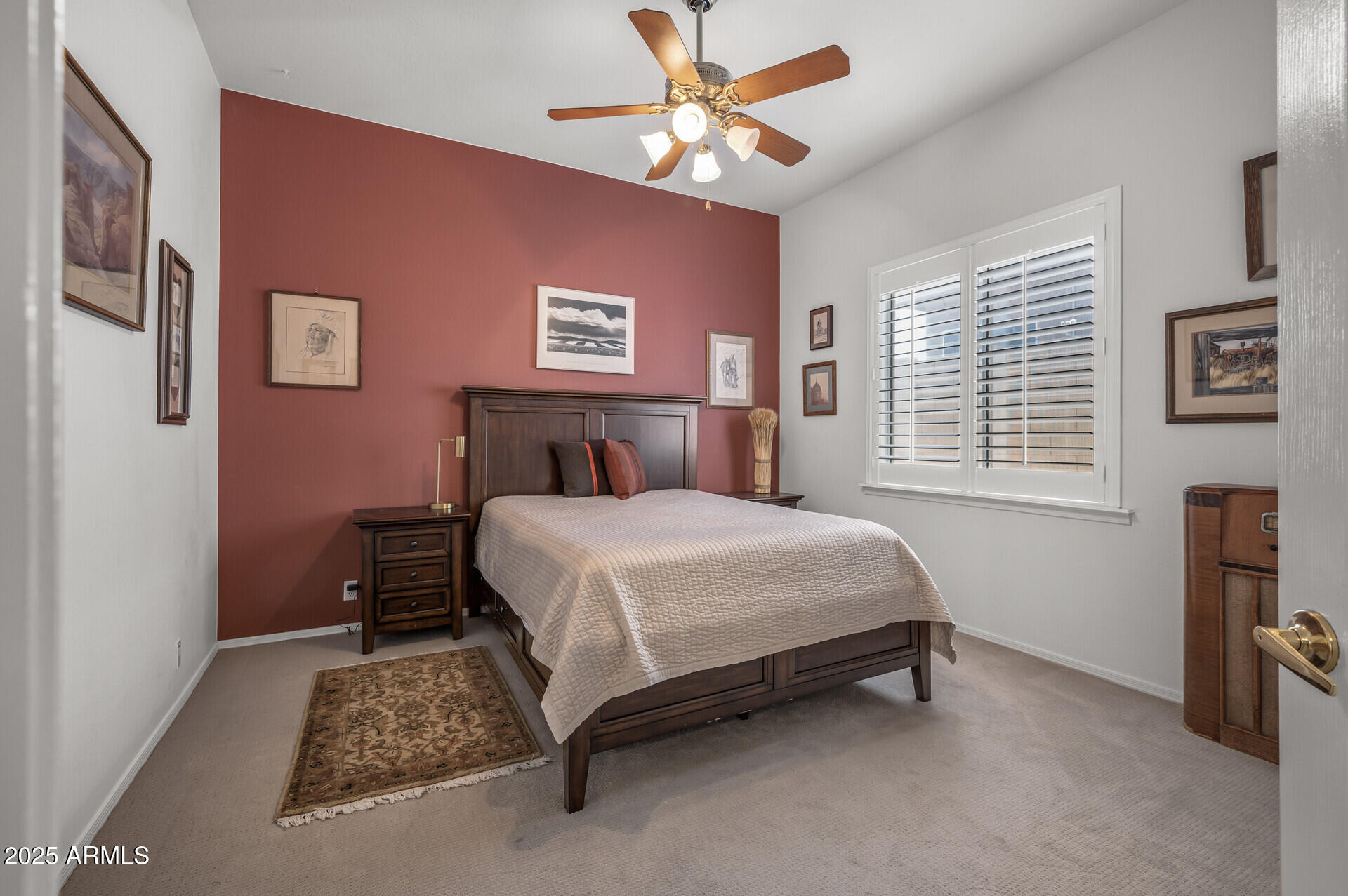 1626 East Kathleen Road Phoenix, AZ 85022 - Photo 37 of 47 a bedroom with a bed and a chandelier