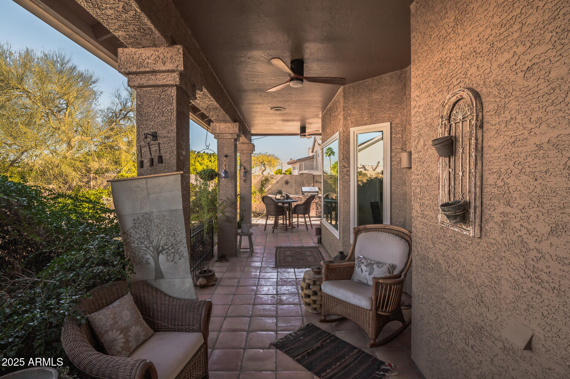 1626 East Kathleen Road Phoenix, AZ 85022 - Photo 41 of 47 a living room with furniture and a floor to ceiling window