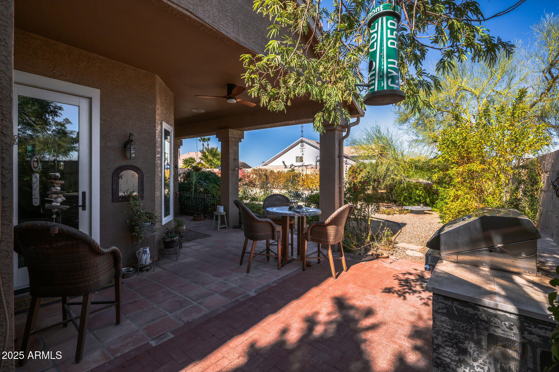 1626 East Kathleen Road Phoenix, AZ 85022 - Photo 44 of 47 a view of a porch with furniture and a yard